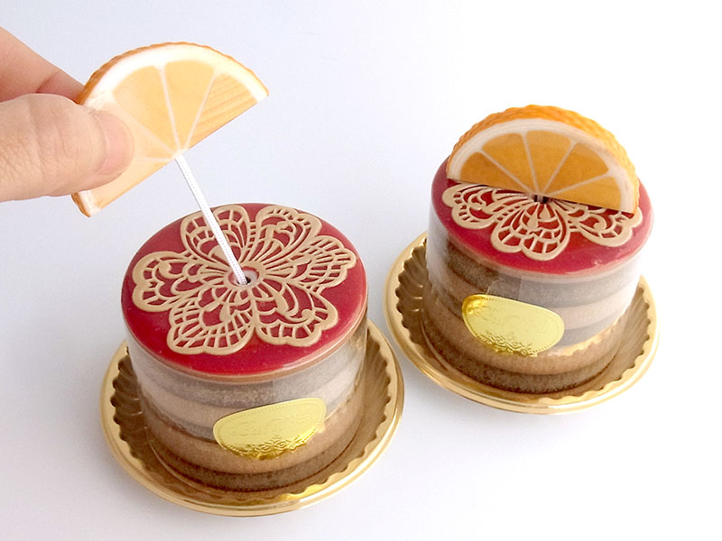 ma612　花模様にオレンジ（丸）ケーキオルゴール